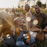 full-shot-happy-family-outdoors